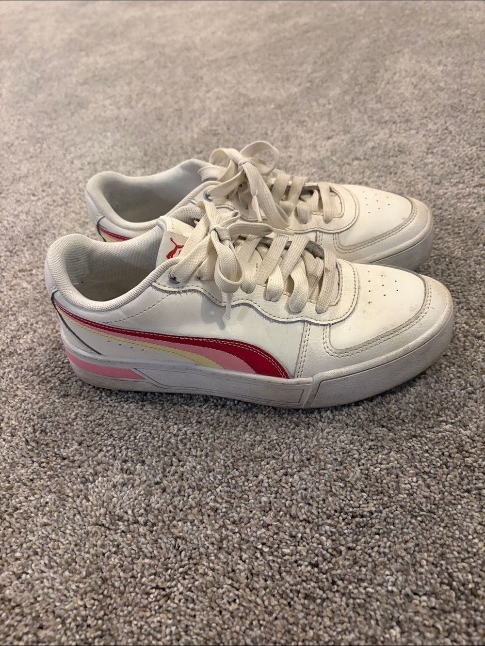Puma White Low-Top Sneakers with Pink and Yellow Accent Stripes